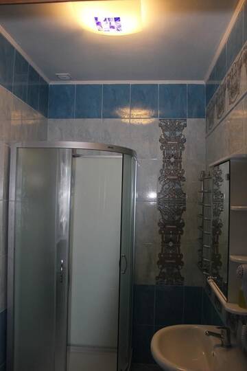 Фото номера Номер Делюкс (для 2 взрослых и 1 ребенка) Мини-отель Turli Inn г. Молодечно 3